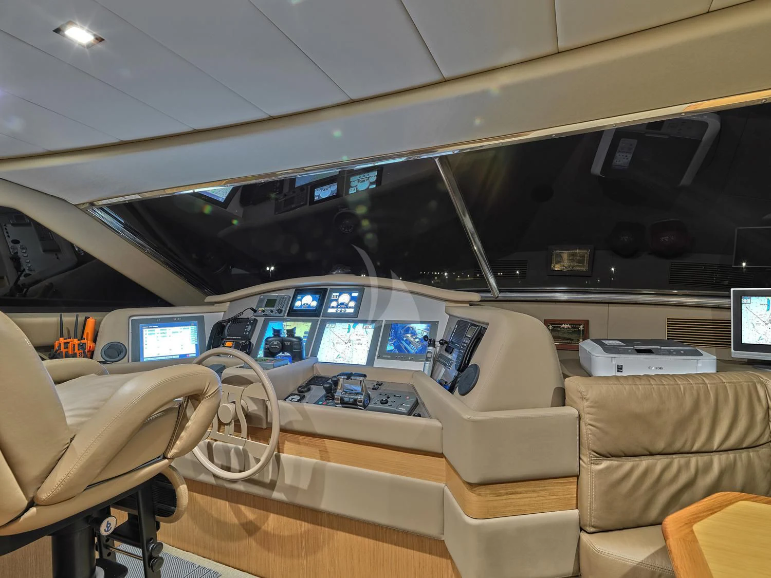 inside of a vehicle with a row of seats and a row of computers aboard JULIE M Yacht for Sale