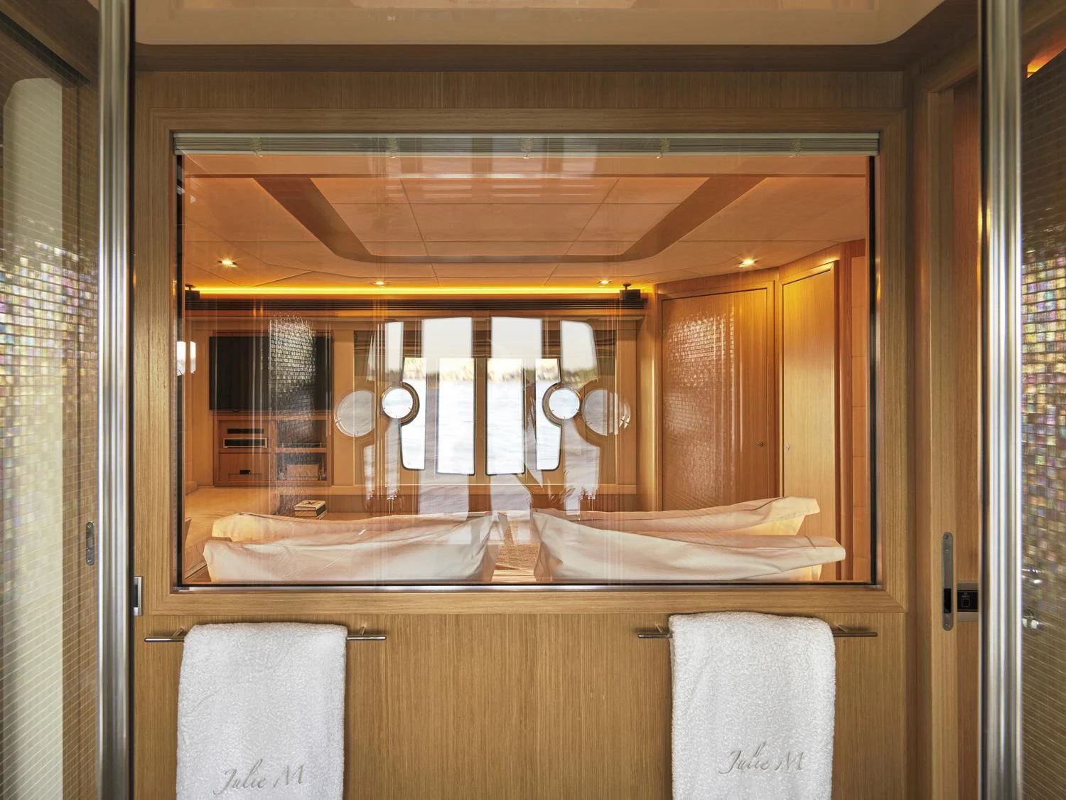 a bathroom with a large mirror aboard JULIE M Yacht for Sale