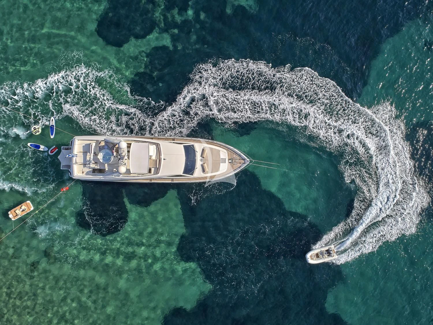a plane flying over a body of water aboard JULIE M Yacht for Sale