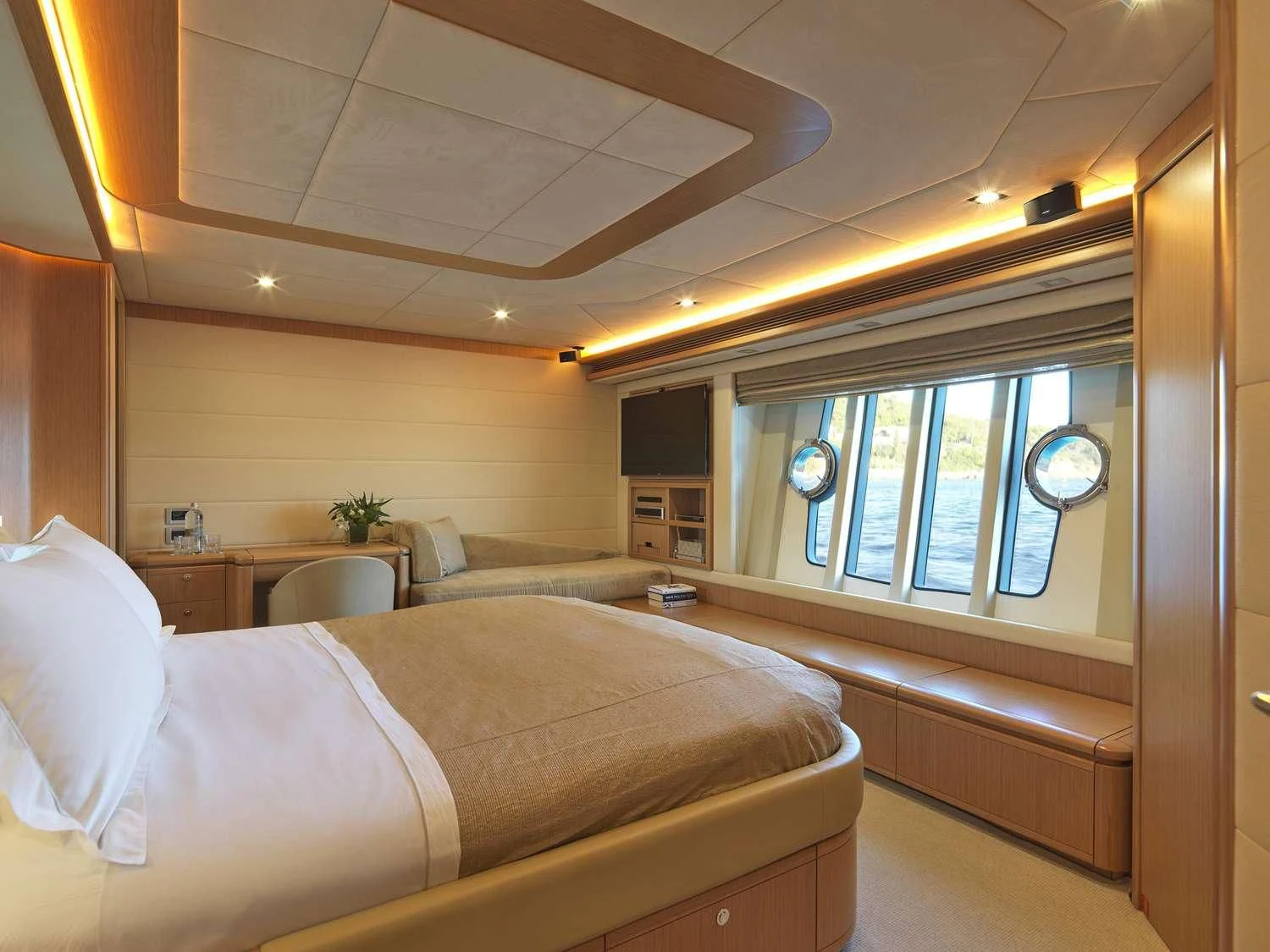 a room with a bed and a window aboard JULIE M Yacht for Sale