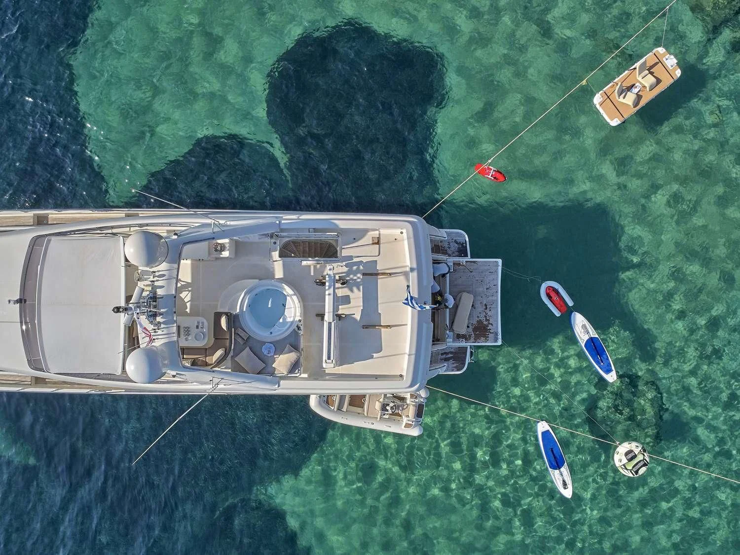 a satellite in the air over a body of water aboard JULIE M Yacht for Sale