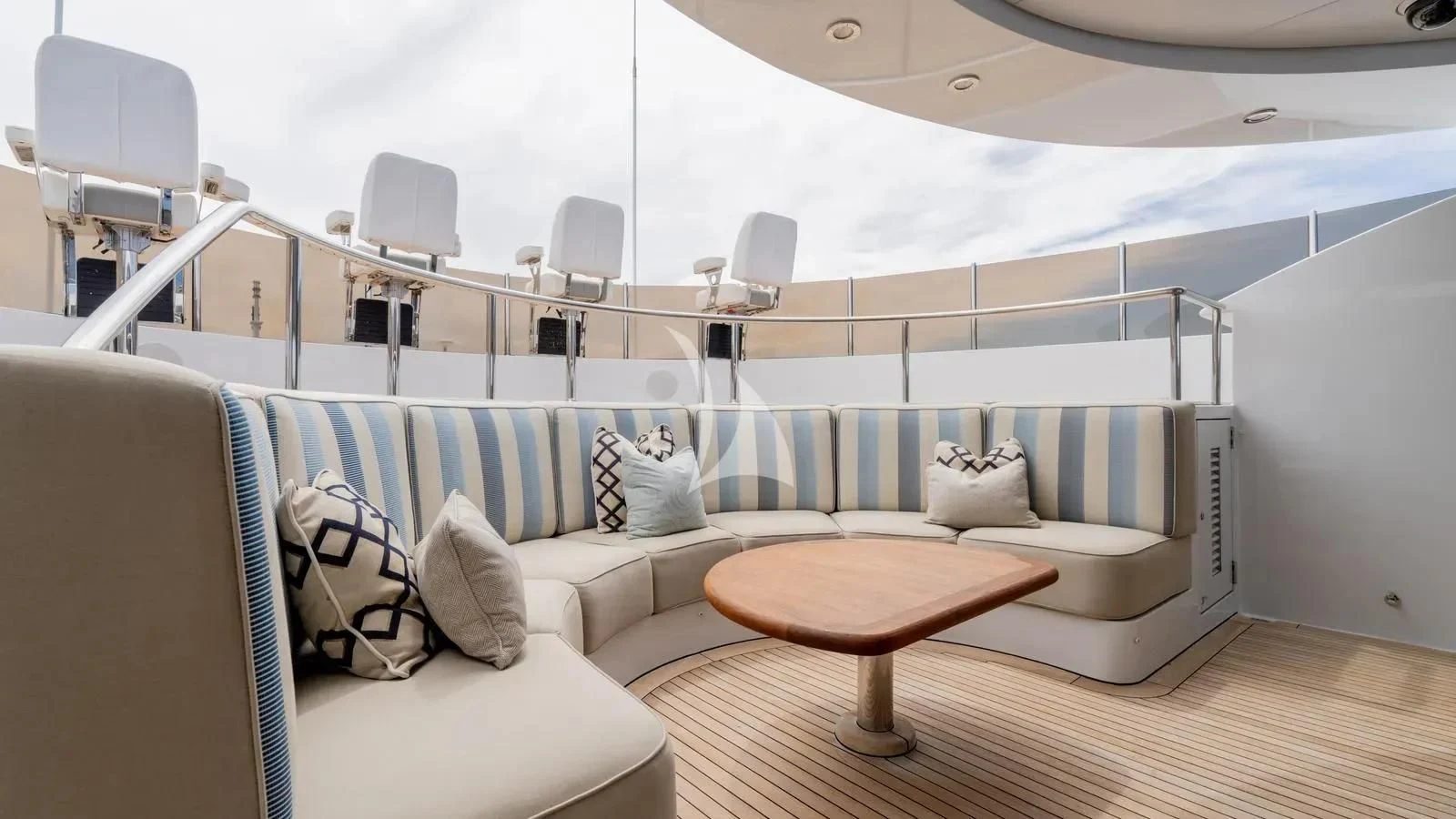a white couch with a coffee table aboard LADY BETH Yacht for Sale
