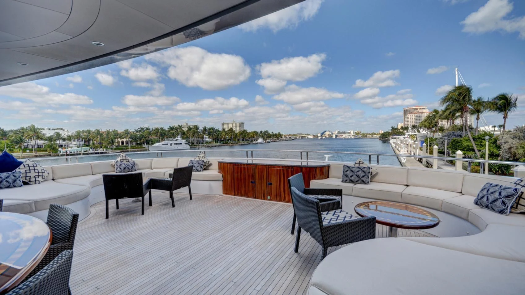 a patio with a table and chairs aboard LADY BETH Yacht for Sale