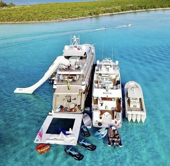 a group of boats on the water aboard LADY BETH Yacht for Sale