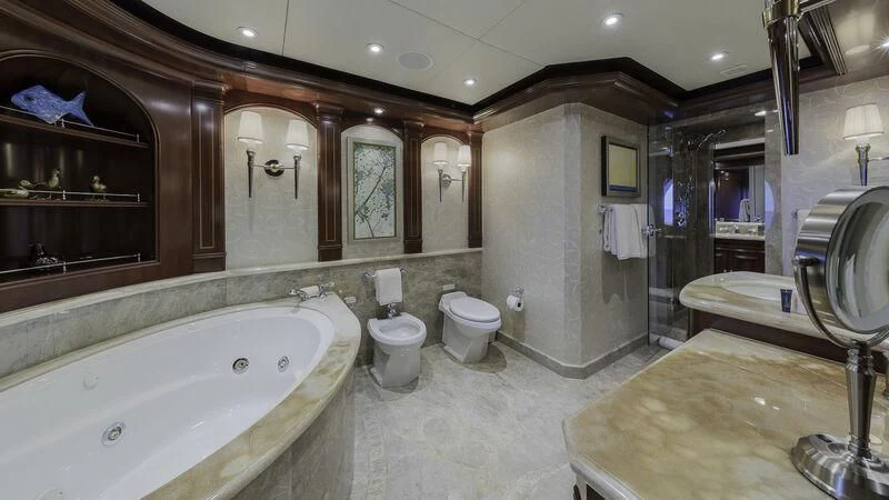 a bathroom with a large tub aboard LADY BETH Yacht for Sale
