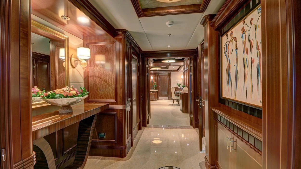 a hallway with a table and chairs aboard LADY BETH Yacht for Sale