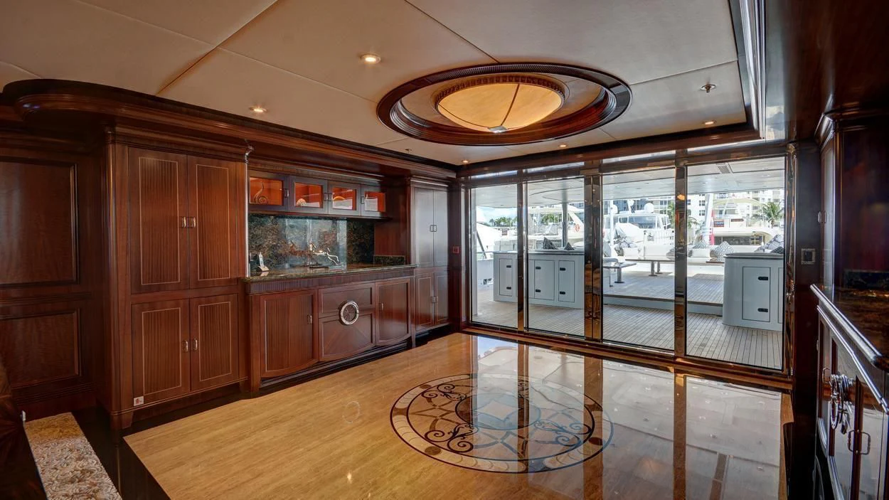 a large kitchen with wooden cabinets aboard LADY BETH Yacht for Sale