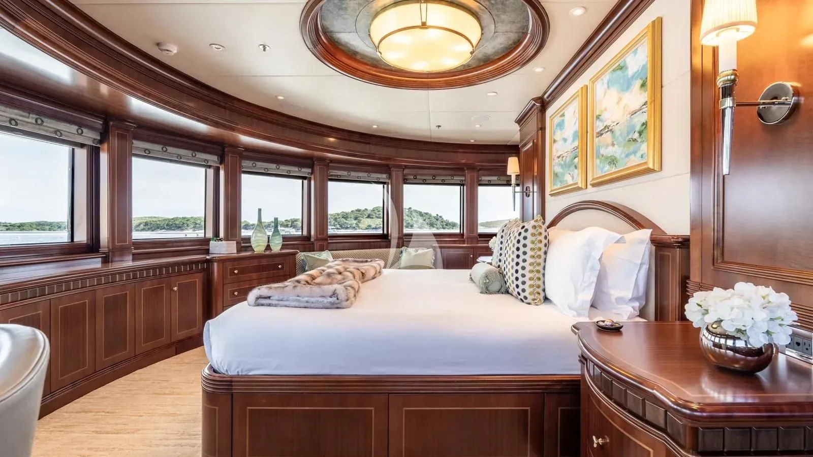a bedroom with a large bed aboard LADY BETH Yacht for Sale