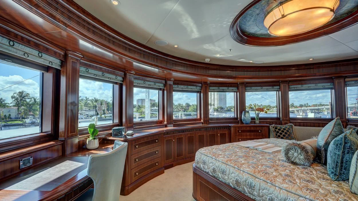 a bedroom with a large bed aboard LADY BETH Yacht for Sale
