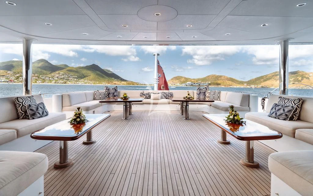 a room with a table and chairs aboard LADY BETH Yacht for Sale