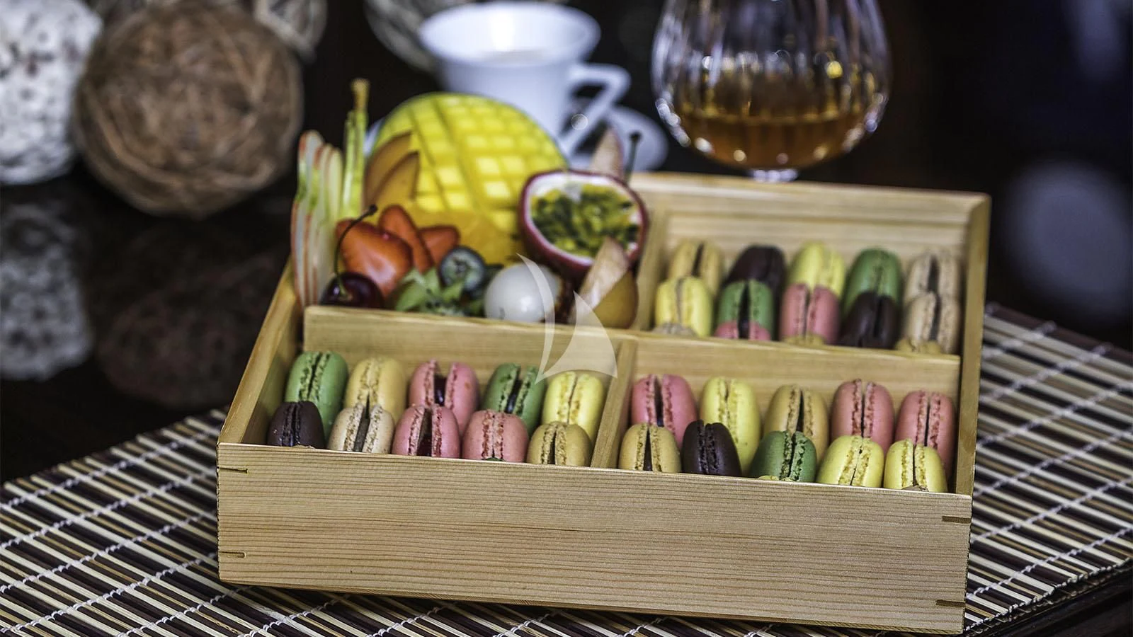 a wooden crate with colorful eggs and vegetables aboard LADY BETH Yacht for Sale