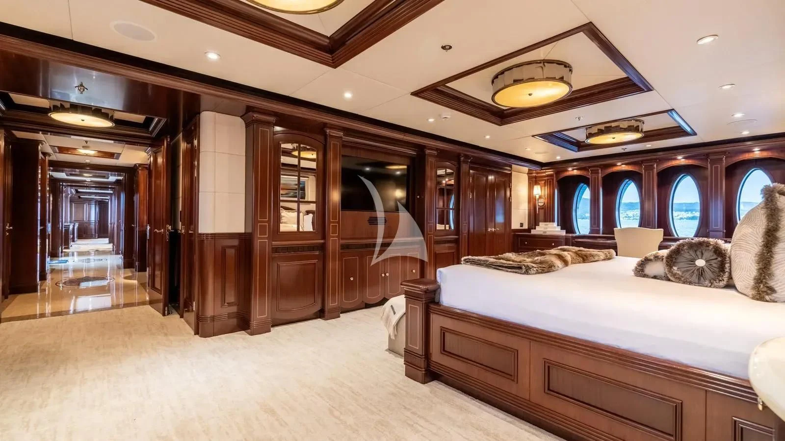 a large bedroom with a large bed aboard LADY BETH Yacht for Sale