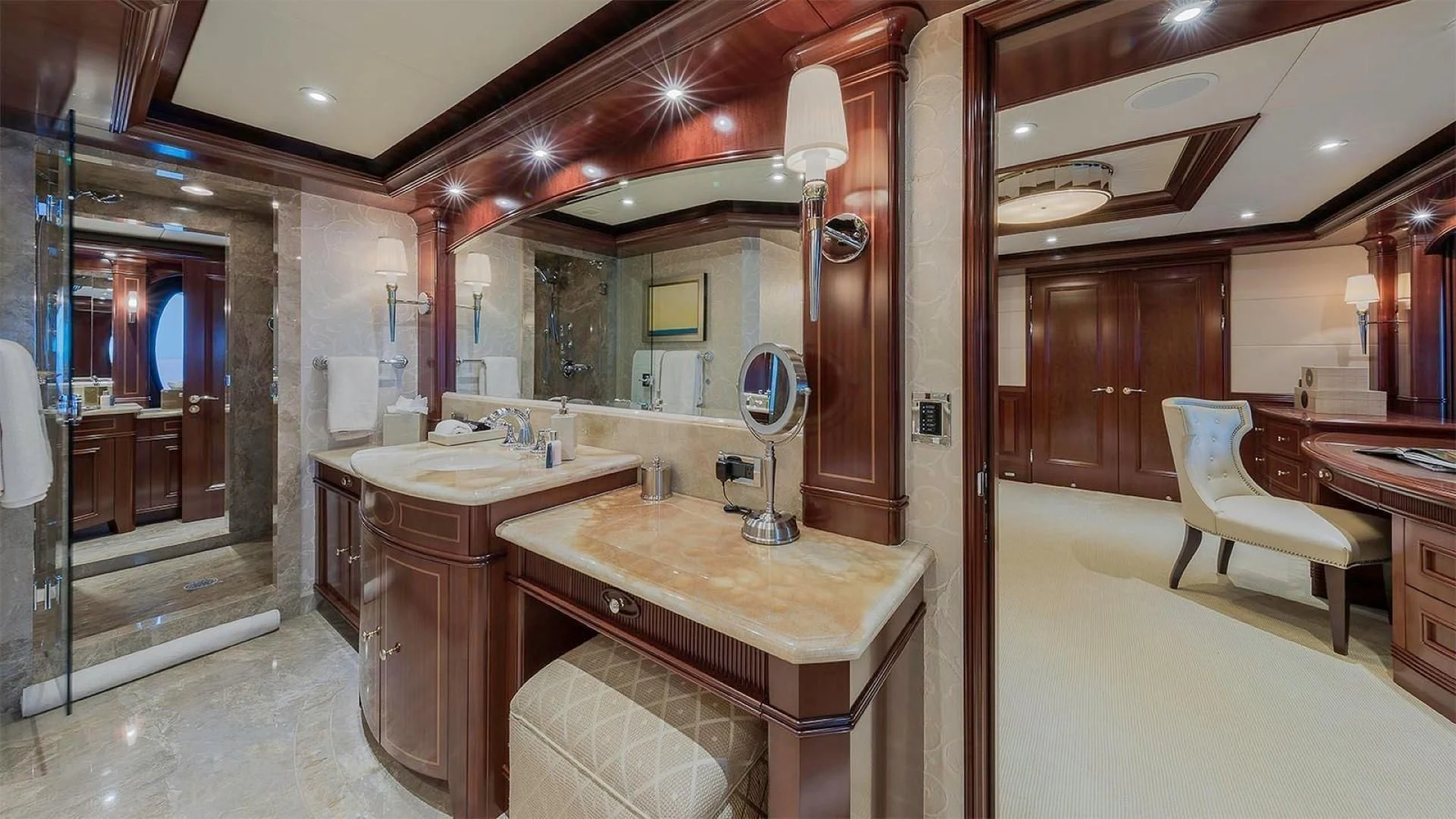 a bathroom with a countertop sink and a mirror aboard LADY BETH Yacht for Sale