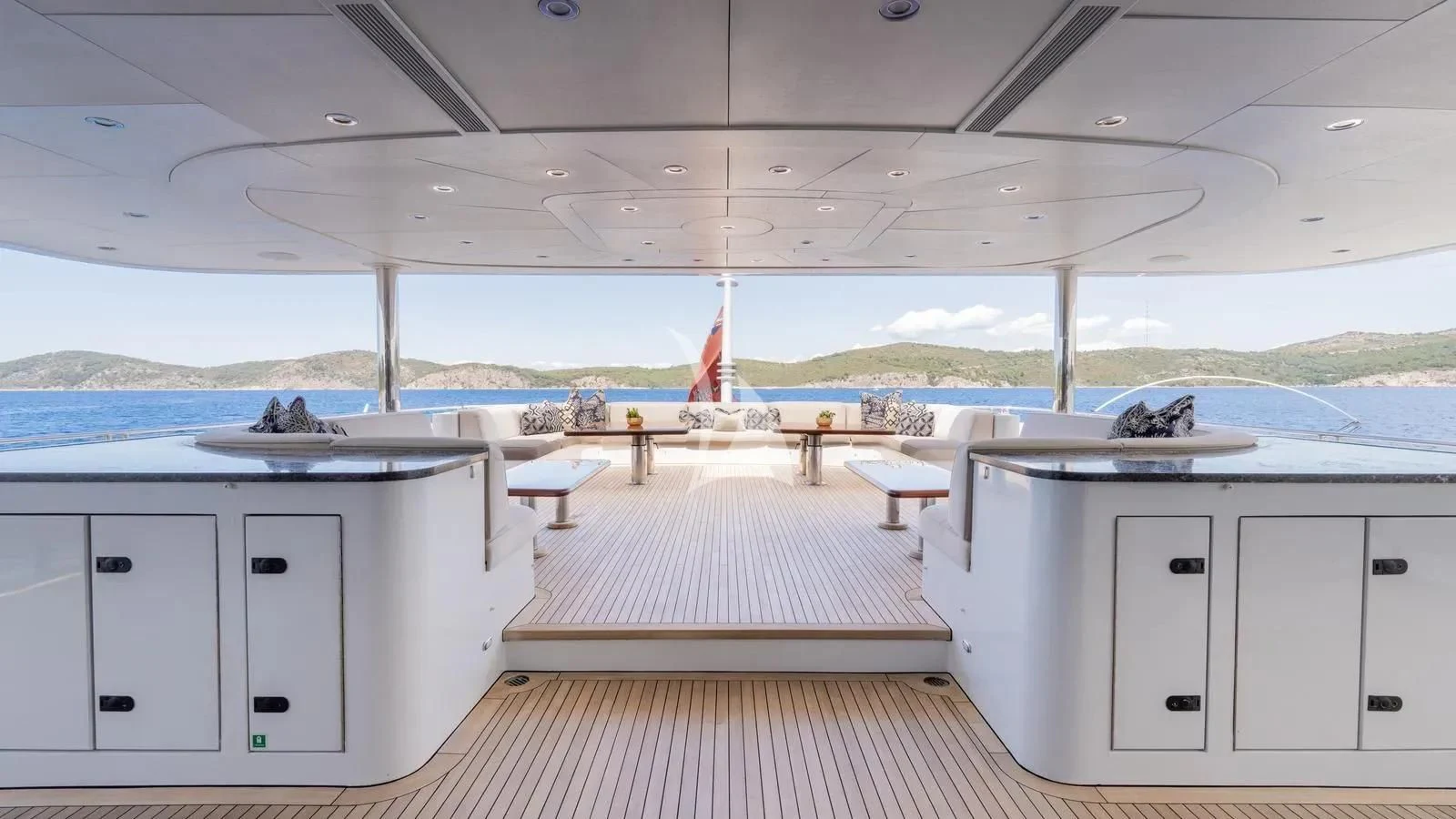 a room with white cabinets and a flag on the roof aboard LADY BETH Yacht for Sale