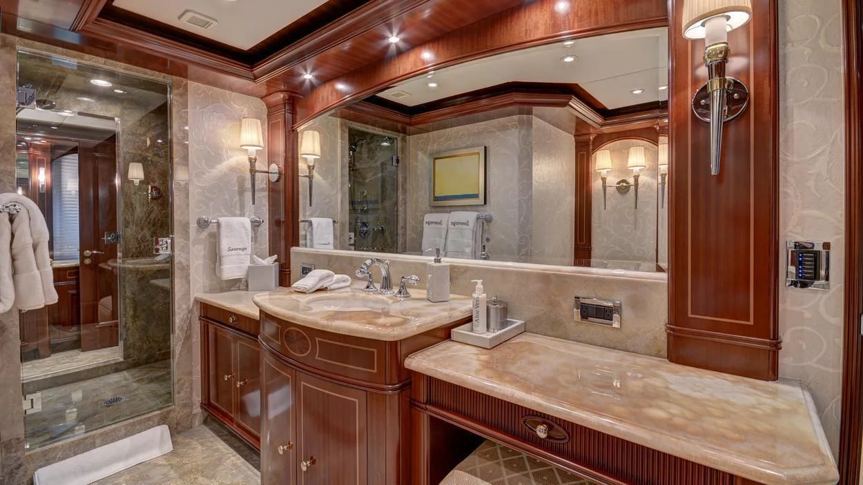 a bathroom with a large mirror aboard LADY BETH Yacht for Sale