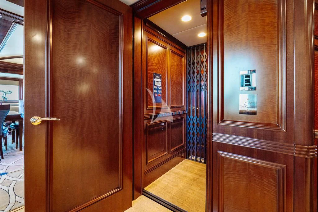 a room with wooden doors aboard LADY BETH Yacht for Sale