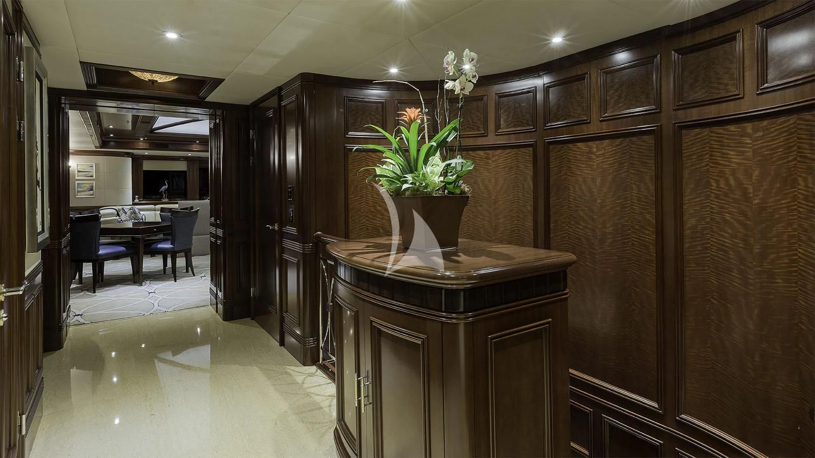 a room with a table and chairs aboard LADY BETH Yacht for Sale