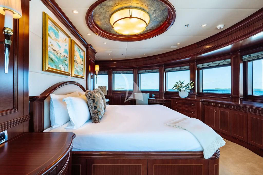 a large bedroom with a large bed aboard LADY BETH Yacht for Sale