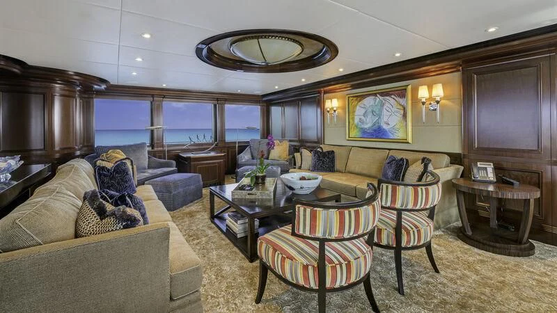a living room with a large window aboard LADY BETH Yacht for Sale