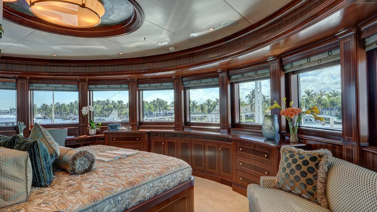 a large bedroom with a large bed aboard LADY BETH Yacht for Sale