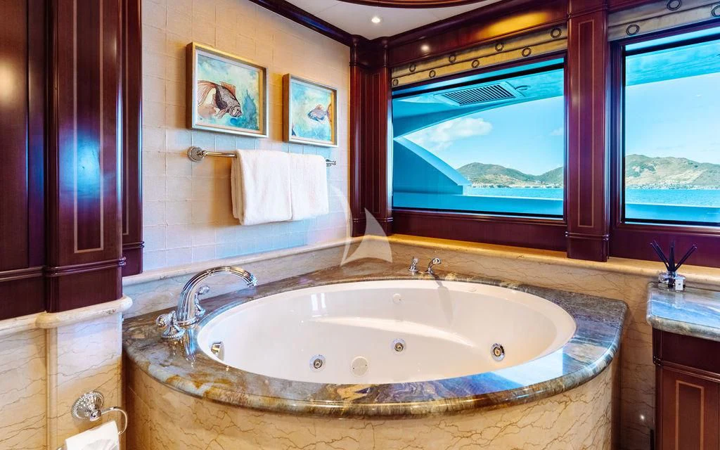 a large bathroom with a large jacuzzi tub aboard LADY BETH Yacht for Sale