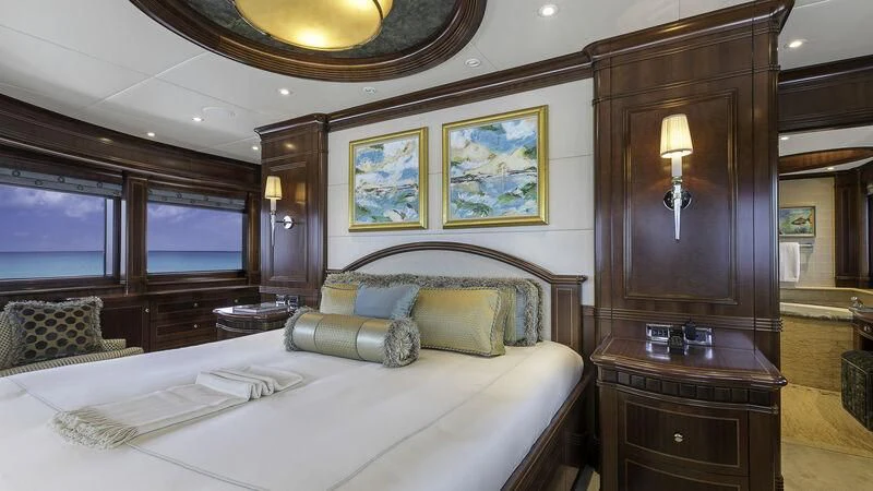 a large bed in a room aboard LADY BETH Yacht for Sale