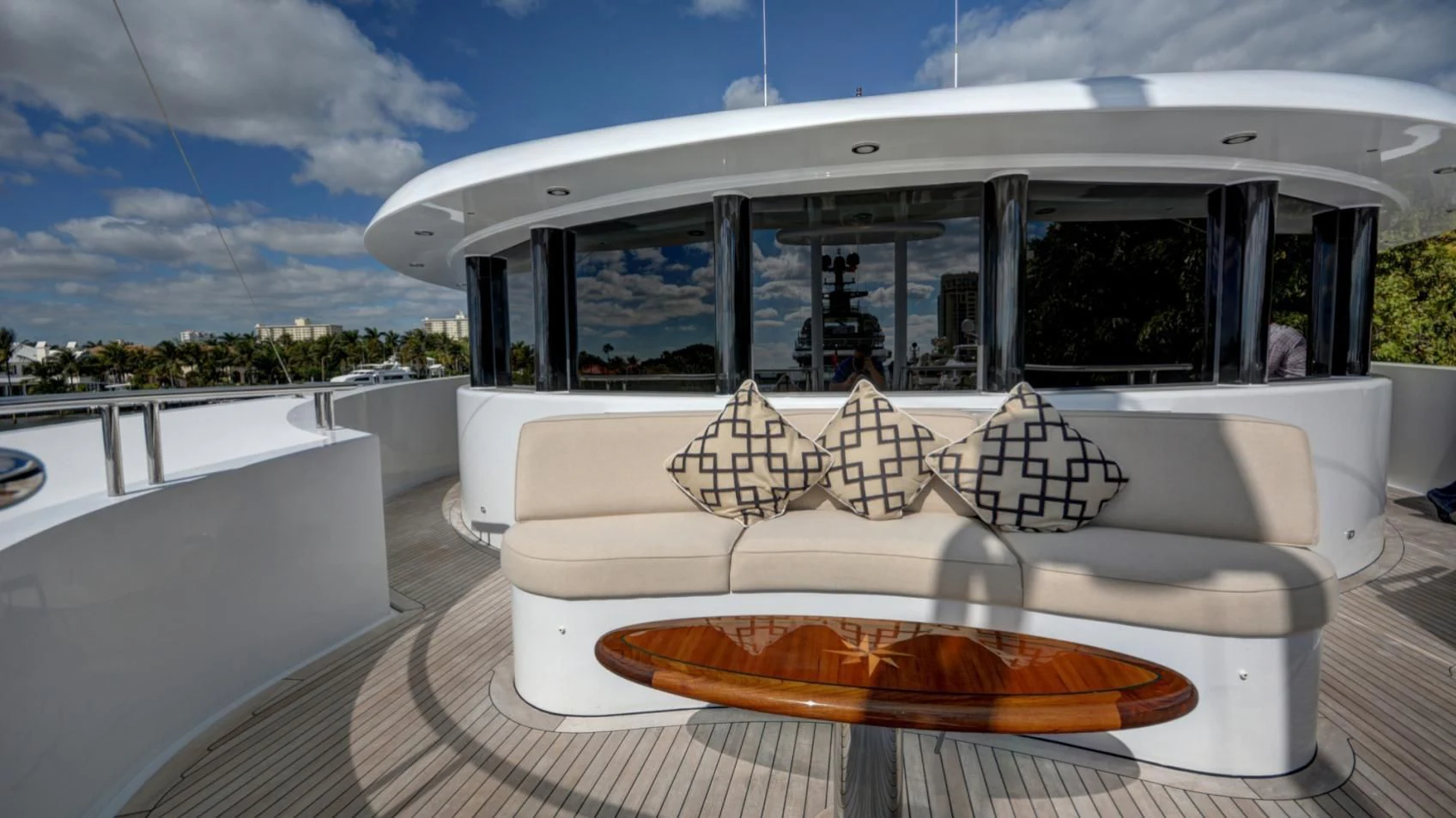 a white lounge chair on a deck aboard LADY BETH Yacht for Sale