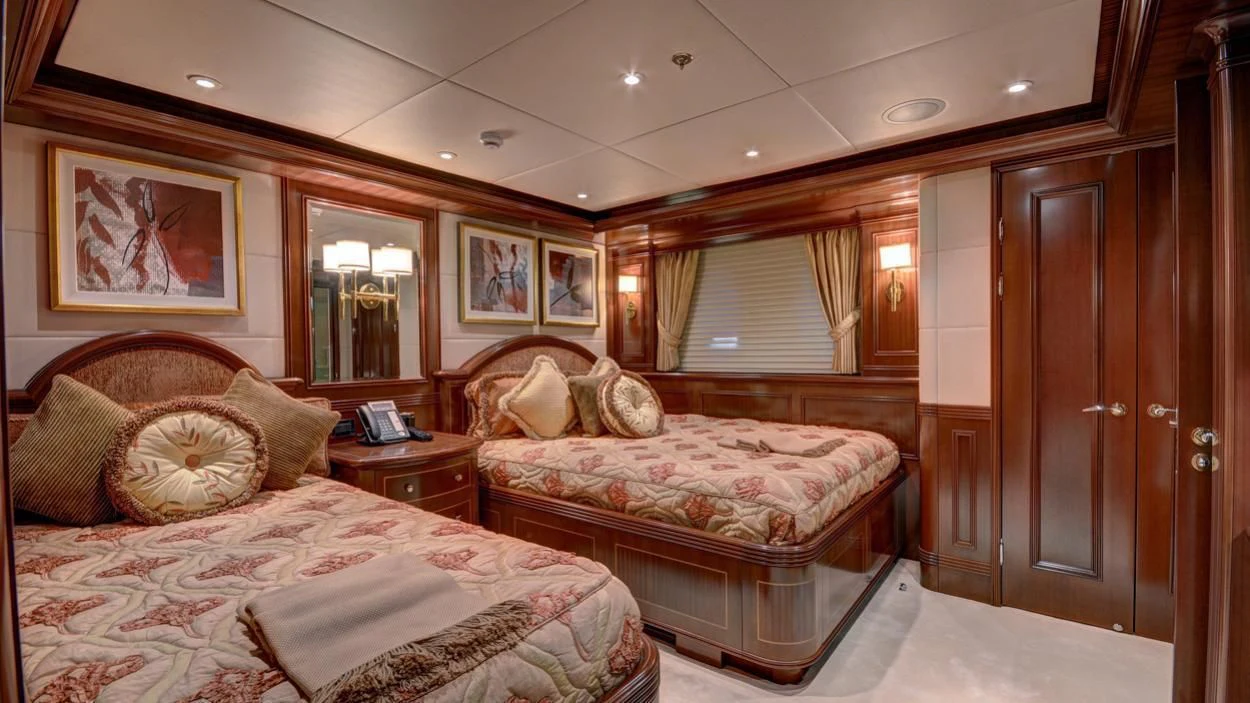 a couple of beds in a hotel room aboard LADY BETH Yacht for Sale