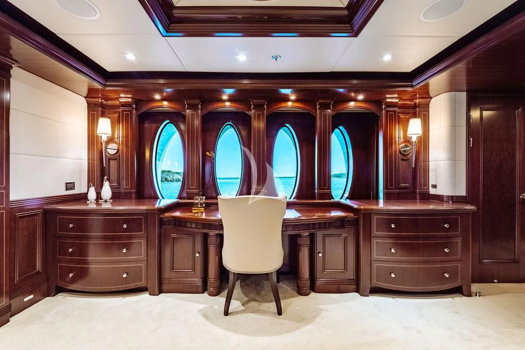 a room with a desk and a chair aboard LADY BETH Yacht for Sale