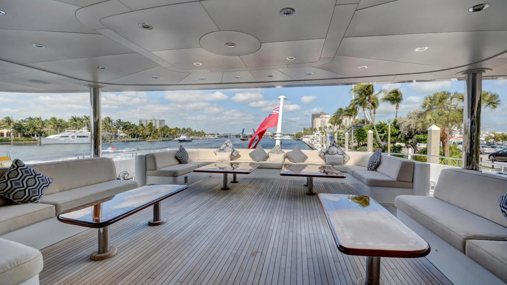 a room with a table chairs and a pool aboard LADY BETH Yacht for Sale
