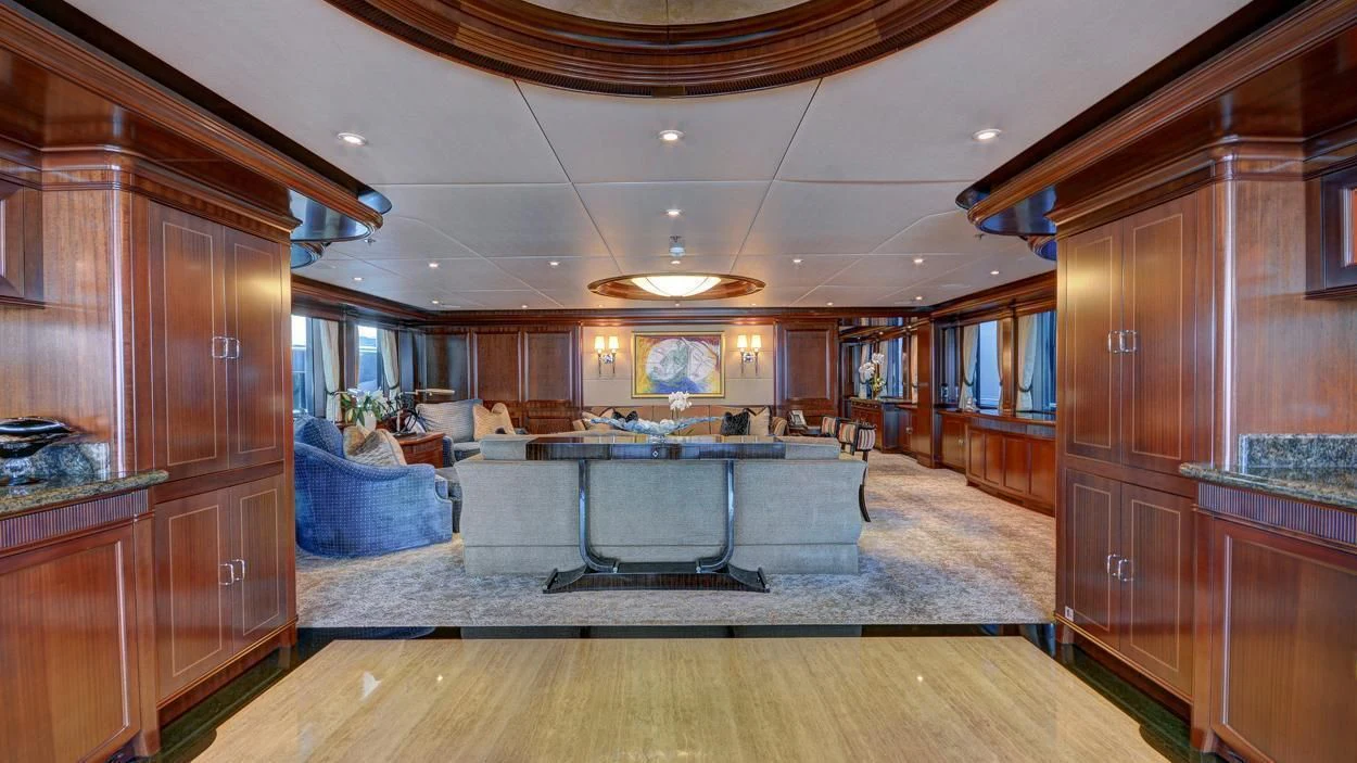 a large kitchen with a bar and bar aboard LADY BETH Yacht for Sale