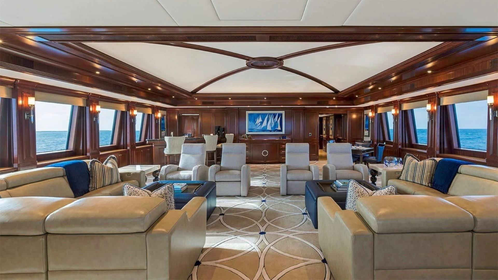 a large room with a large screen aboard LADY BETH Yacht for Sale