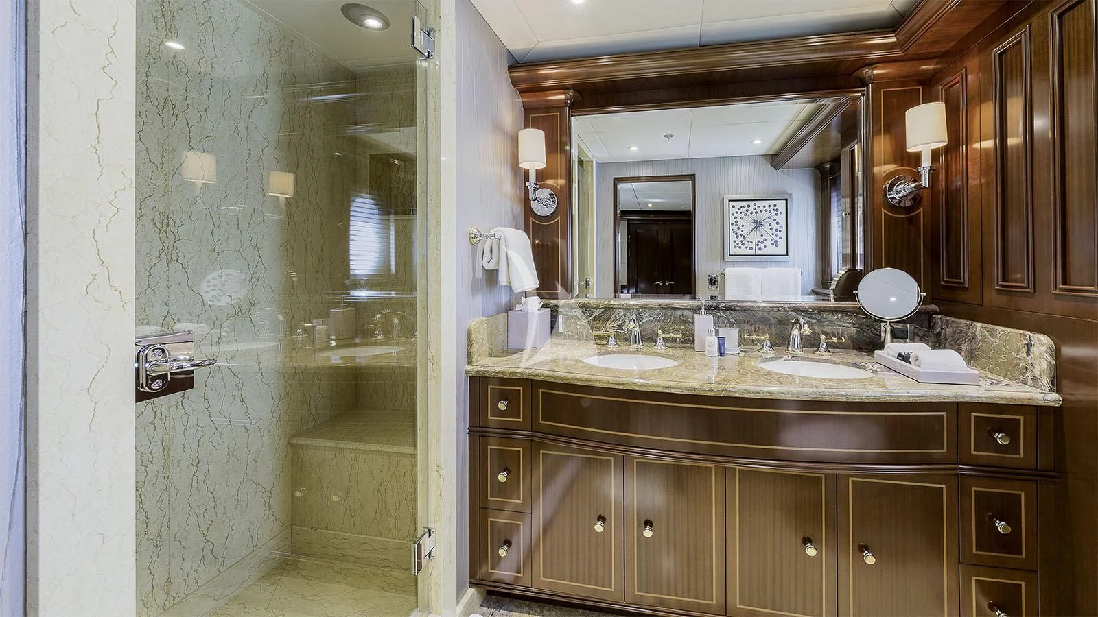 a bathroom with a glass shower aboard LADY BETH Yacht for Sale