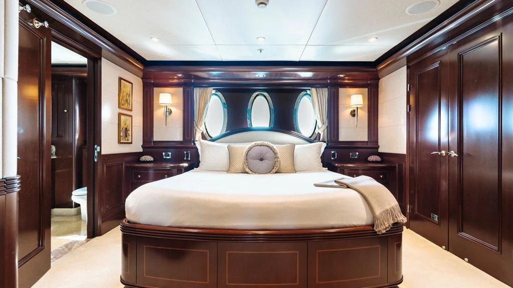 a bed in a room aboard LADY BETH Yacht for Sale