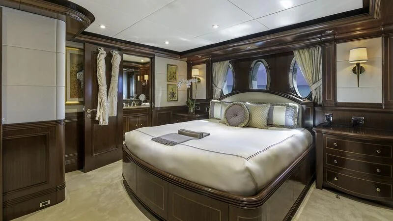 a bed in a room aboard LADY BETH Yacht for Sale