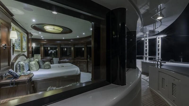 a large bathroom with a large mirror aboard LADY BETH Yacht for Sale