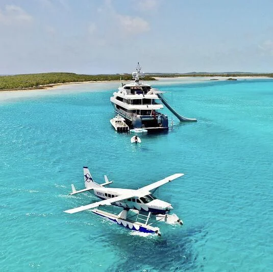 a plane and a plane in the water aboard LADY BETH Yacht for Sale