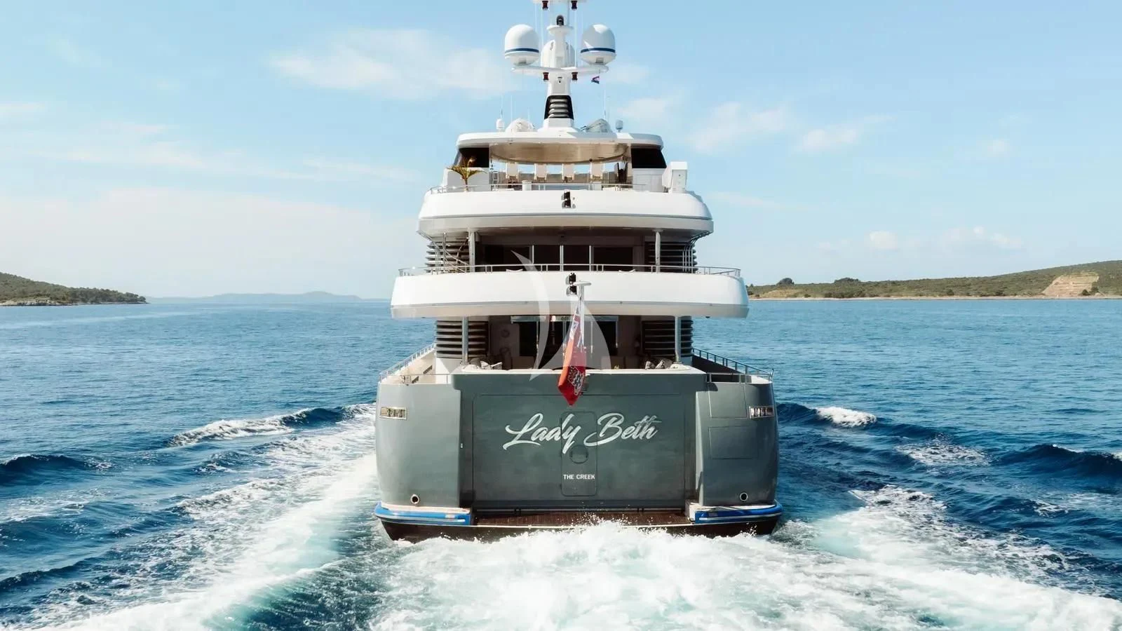a boat on the water aboard LADY BETH Yacht for Sale