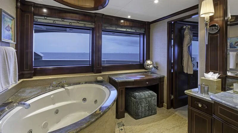 a bathroom with a large bathtub aboard LADY BETH Yacht for Sale