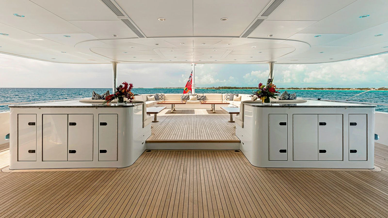 a room with white cabinets and white cabinets and a large body of water aboard LADY BETH Yacht for Sale