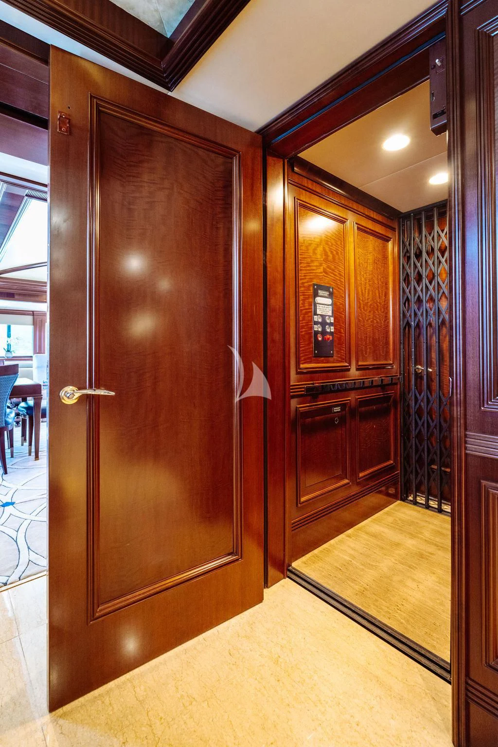 a wood door in a room aboard LADY BETH Yacht for Sale