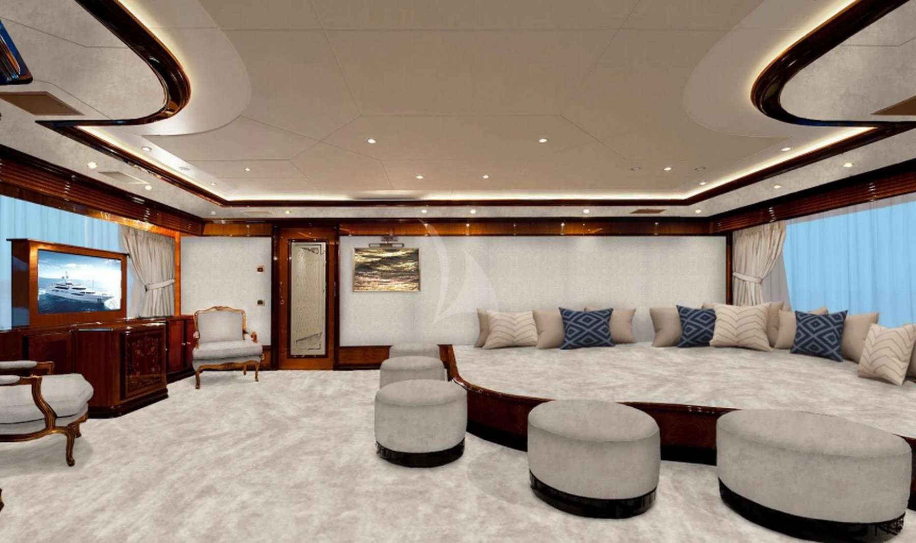 a large living room with a large bed and a large television aboard DILARA Yacht for Sale