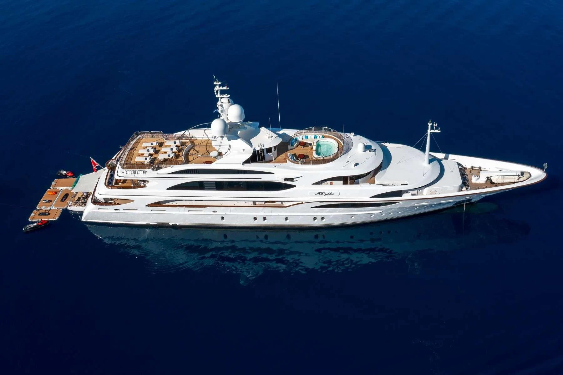 a white boat in the water aboard DILARA Yacht for Sale