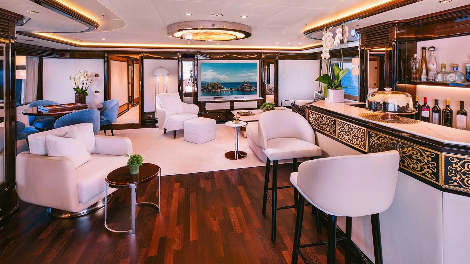 a large room with a table and chairs aboard DILARA Yacht for Sale