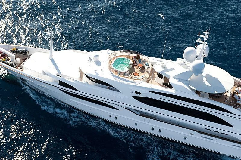 a white yacht in the water aboard DILARA Yacht for Sale
