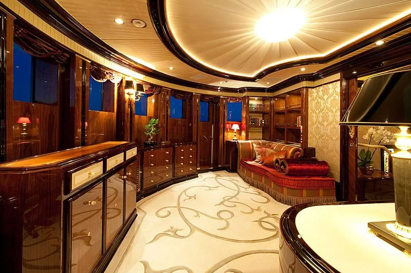 a large room with a large mirror aboard DILARA Yacht for Sale