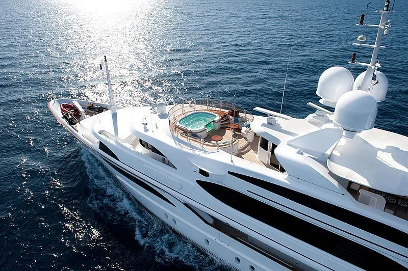 a white boat in the water aboard DILARA Yacht for Sale