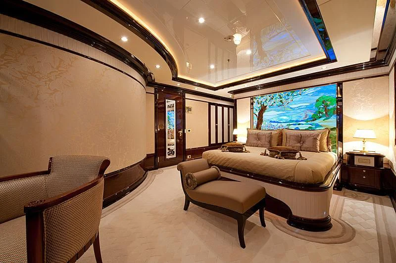 a living room with a large screen aboard DILARA Yacht for Sale