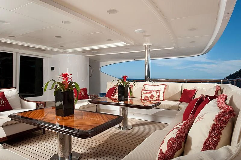 a living room with a large window overlooking the ocean aboard DILARA Yacht for Sale