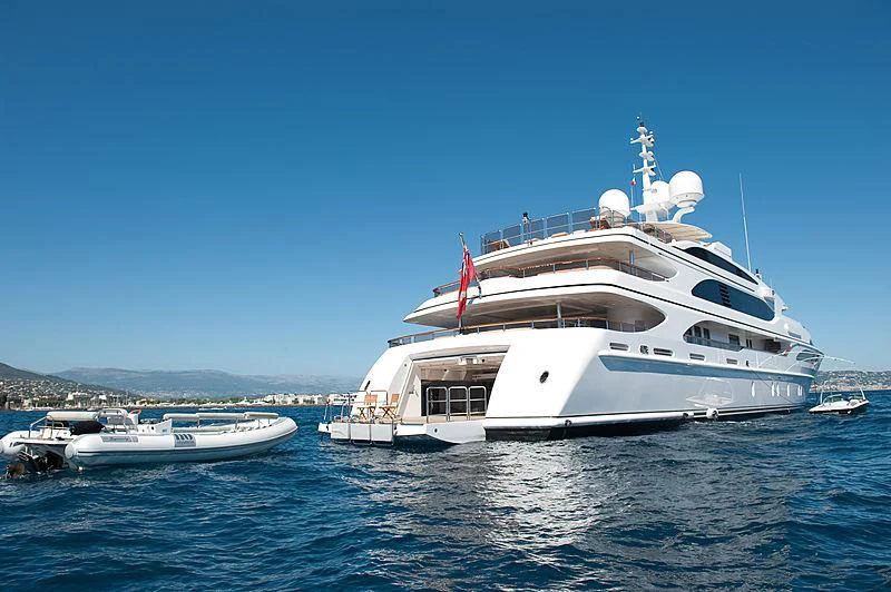 a large white boat in the water aboard DILARA Yacht for Sale